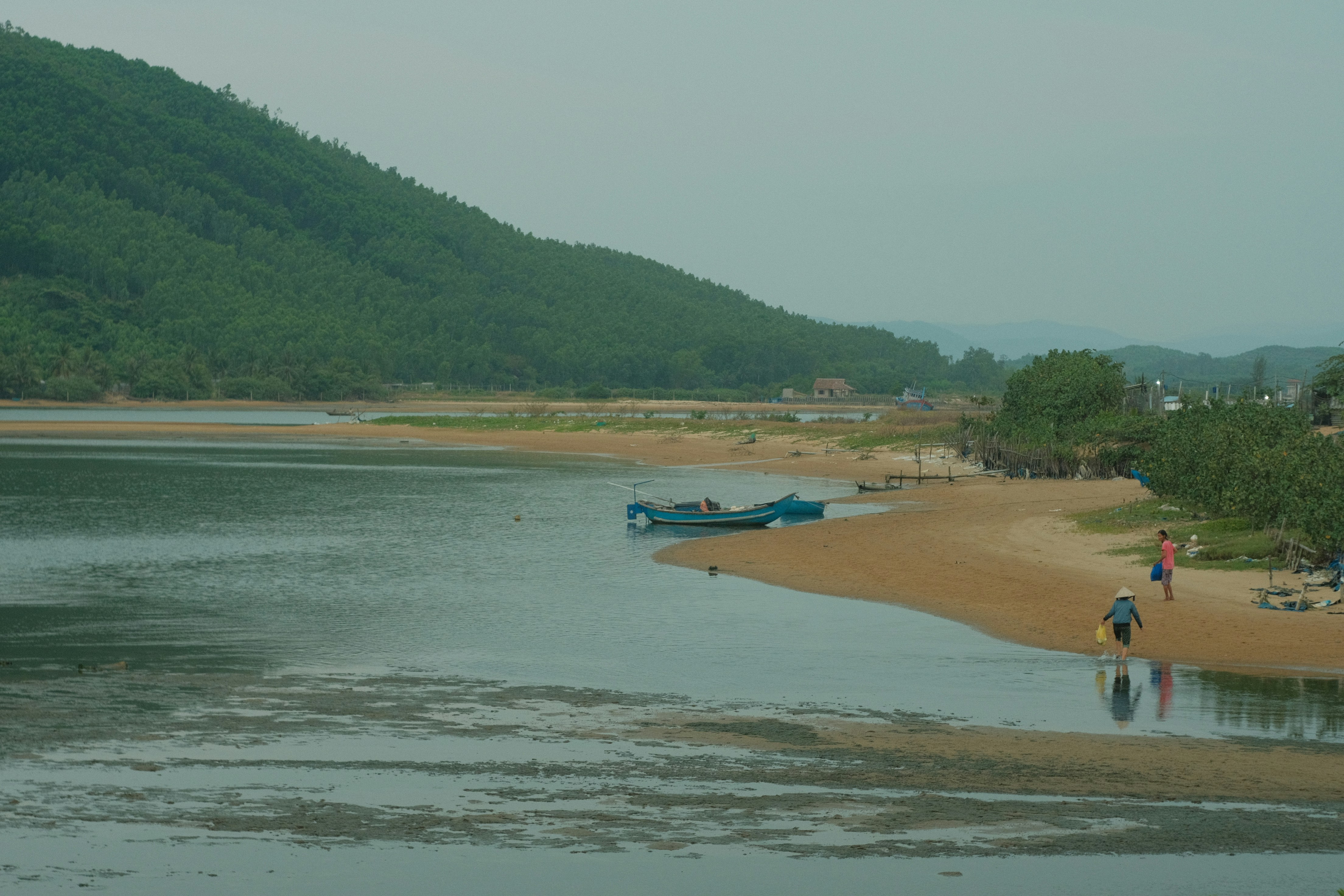 a couple of boats that are sitting in the water