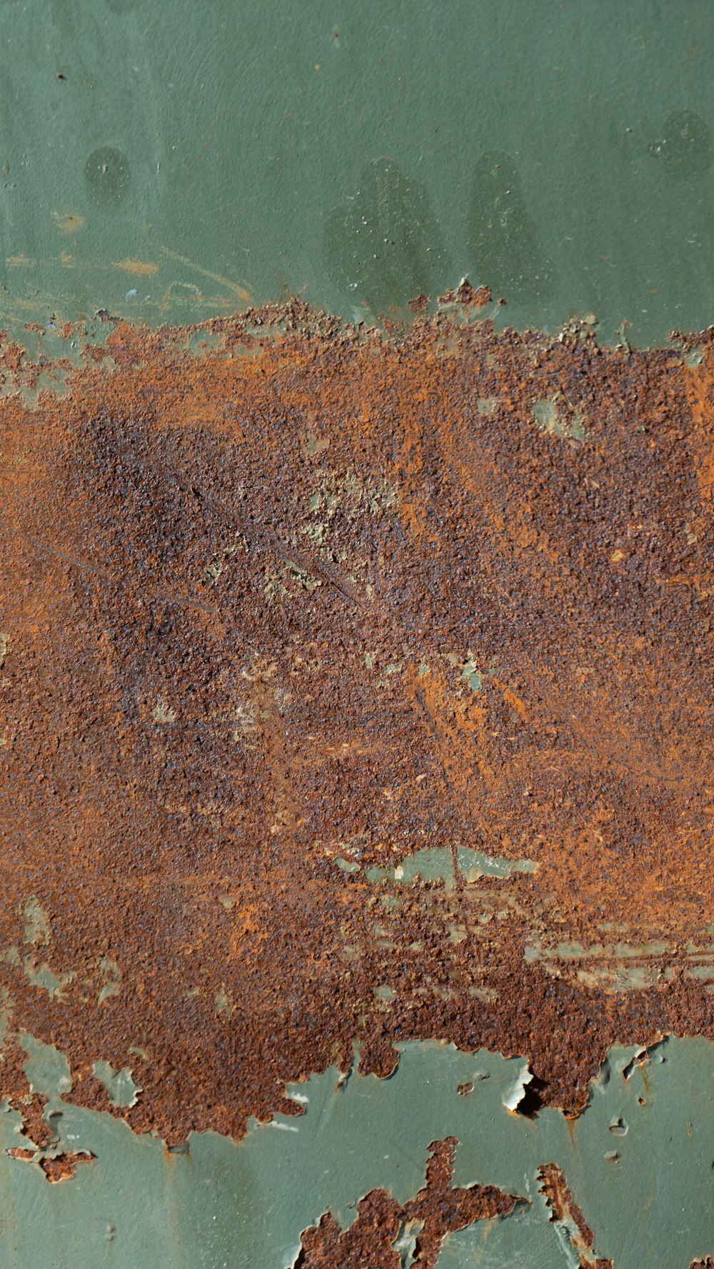 a rusted metal surface with rust on it