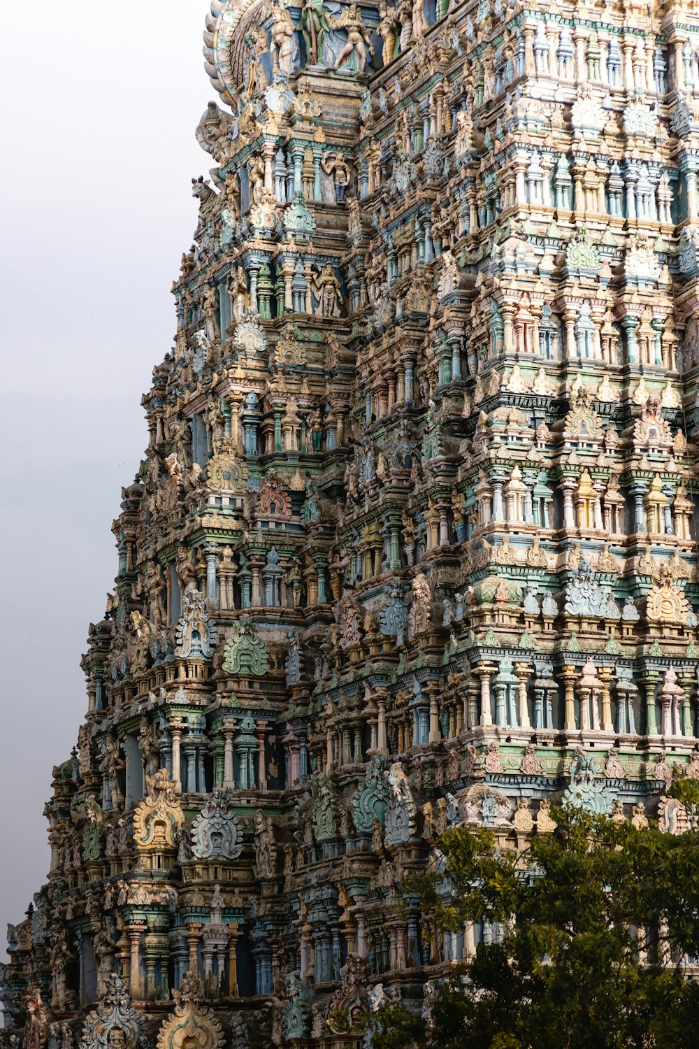 a tall tower with a clock on the top of it