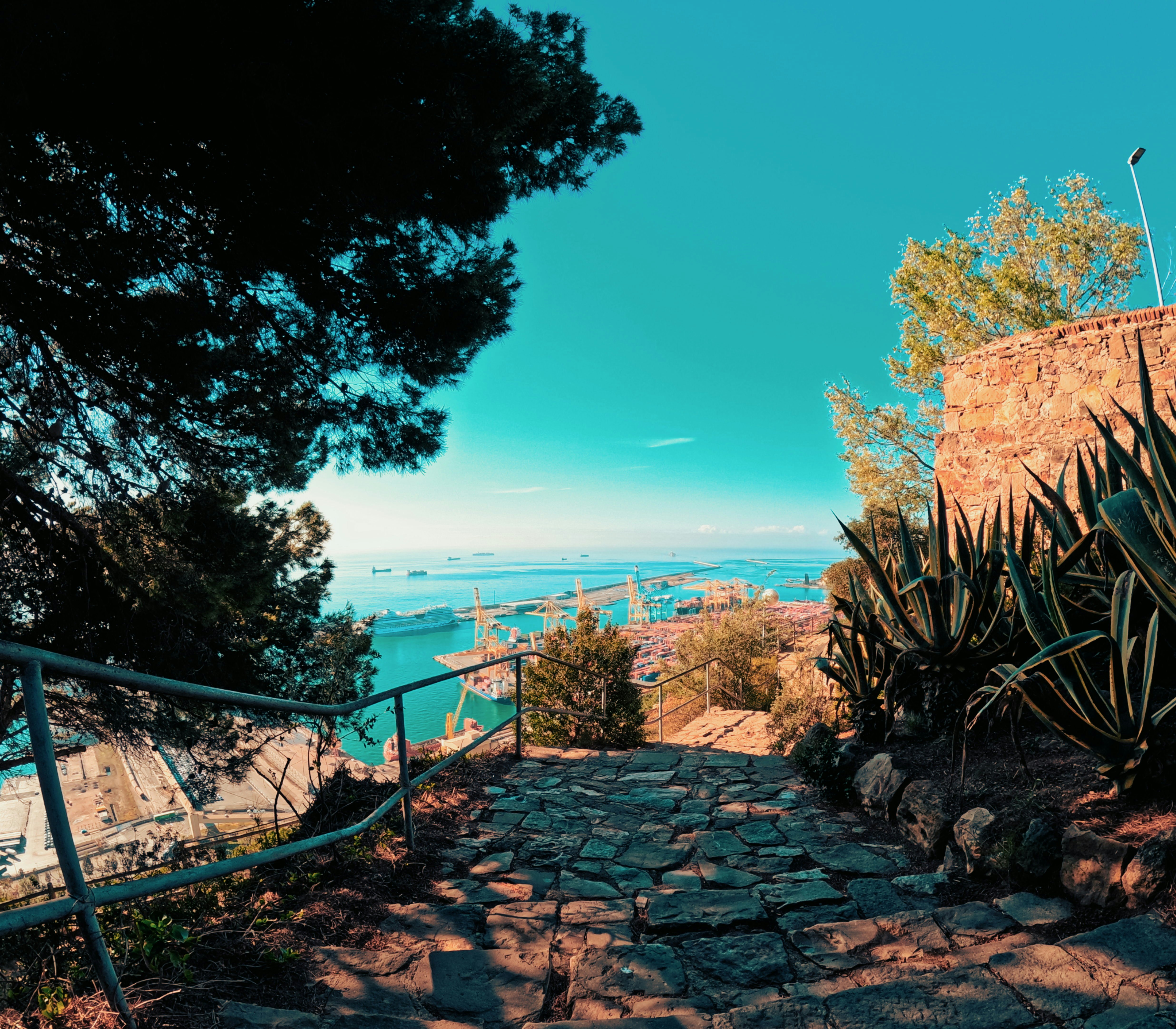 a stone path leading up to the ocean