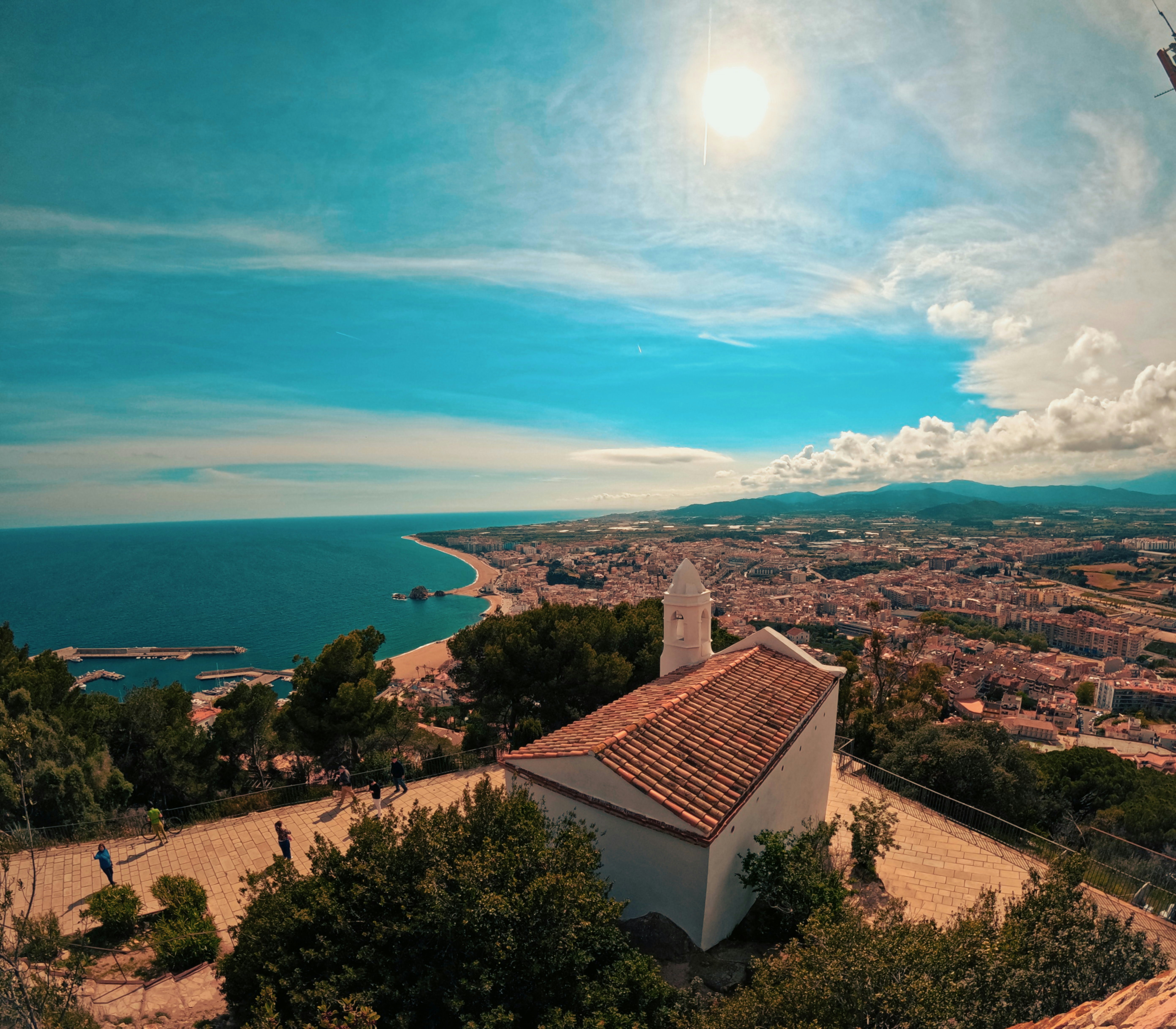 a church on a hill overlooking the ocean