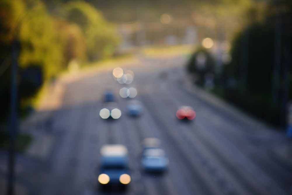 a blurry photo of a highway with cars on it