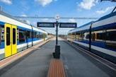 a couple of trains that are next to each other
