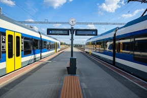 a couple of trains that are next to each other