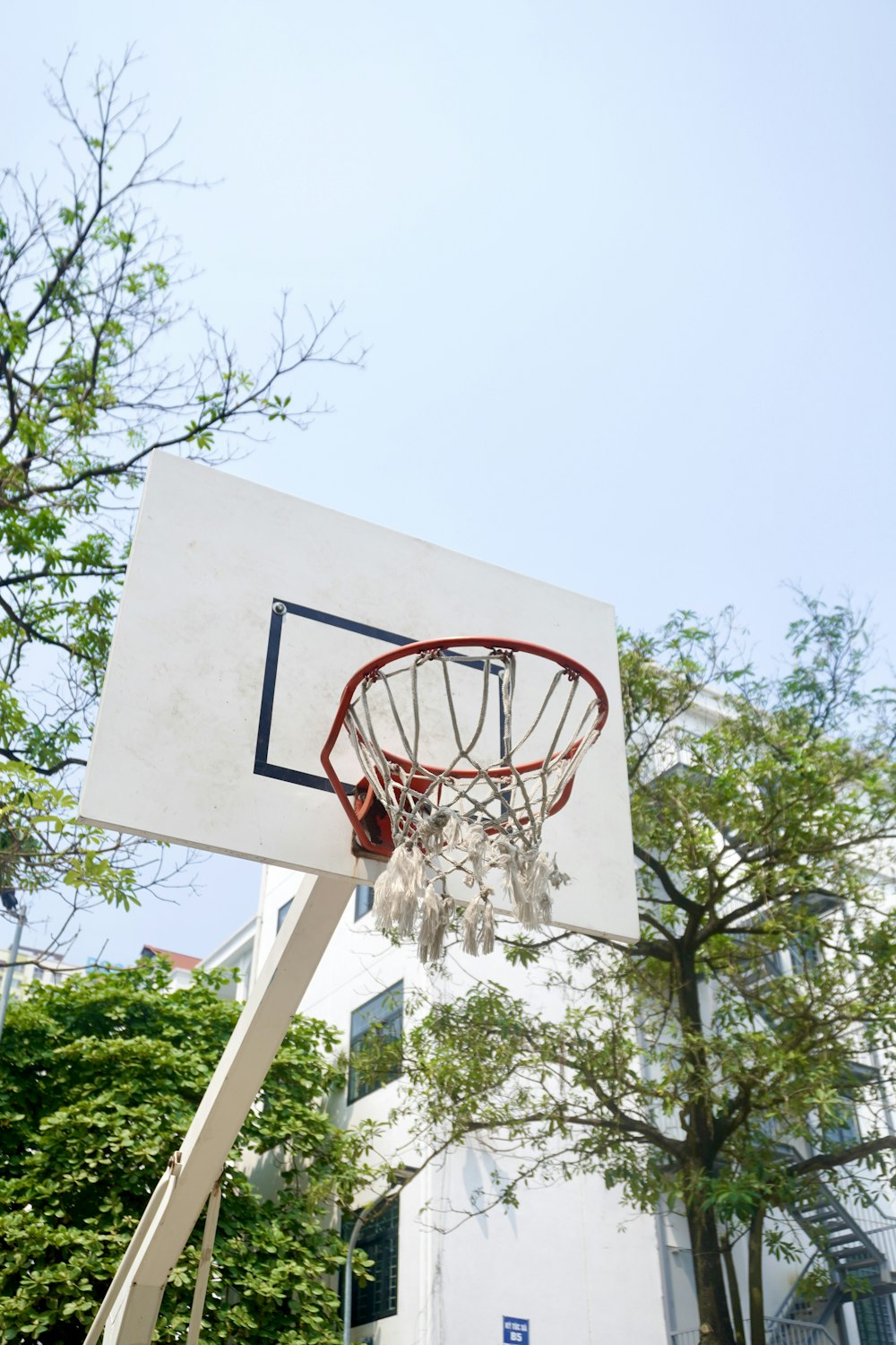 a basketball hoop in front of a house