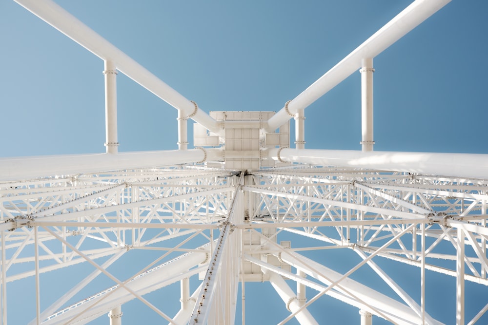 a close up of a metal structure against a blue sky