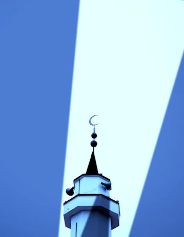 a tall tower with a clock on top of it