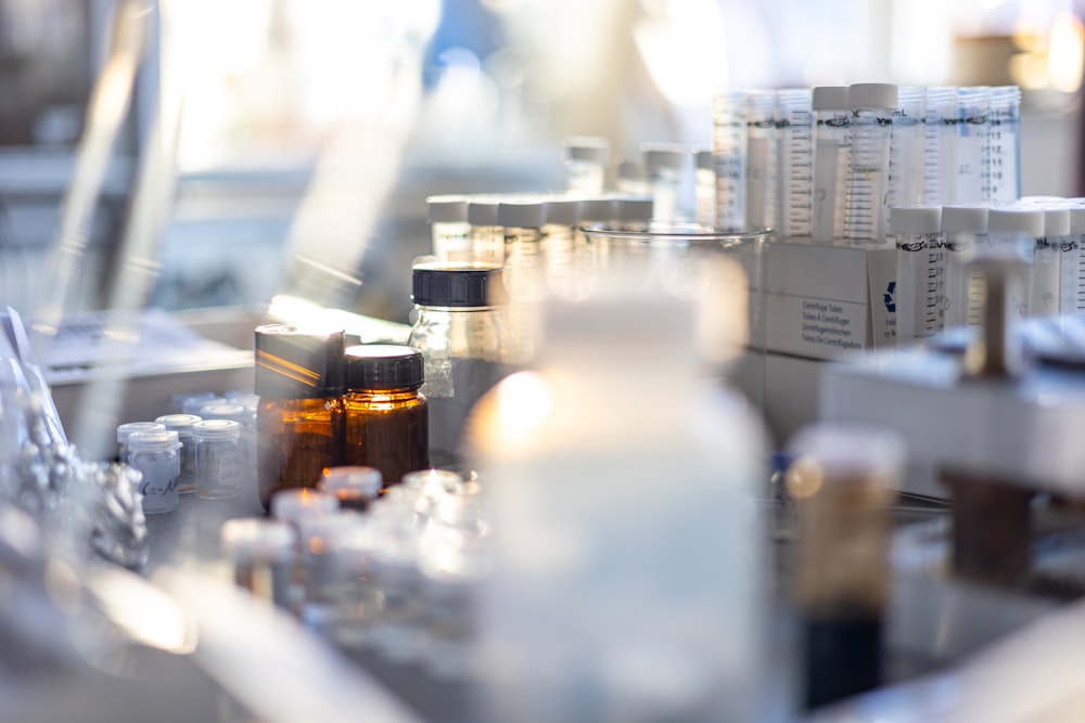 bottles of medicine are lined up on a table