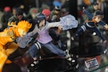 a group of action figures on display on a table