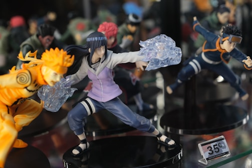 a group of action figures on display on a table