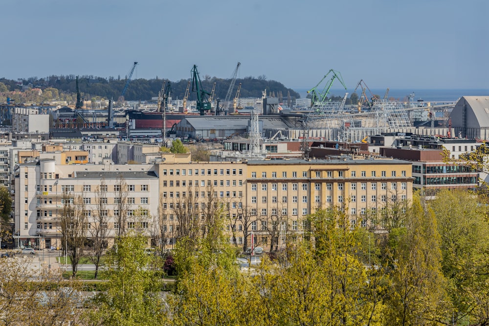 a city with lots of tall buildings and lots of trees