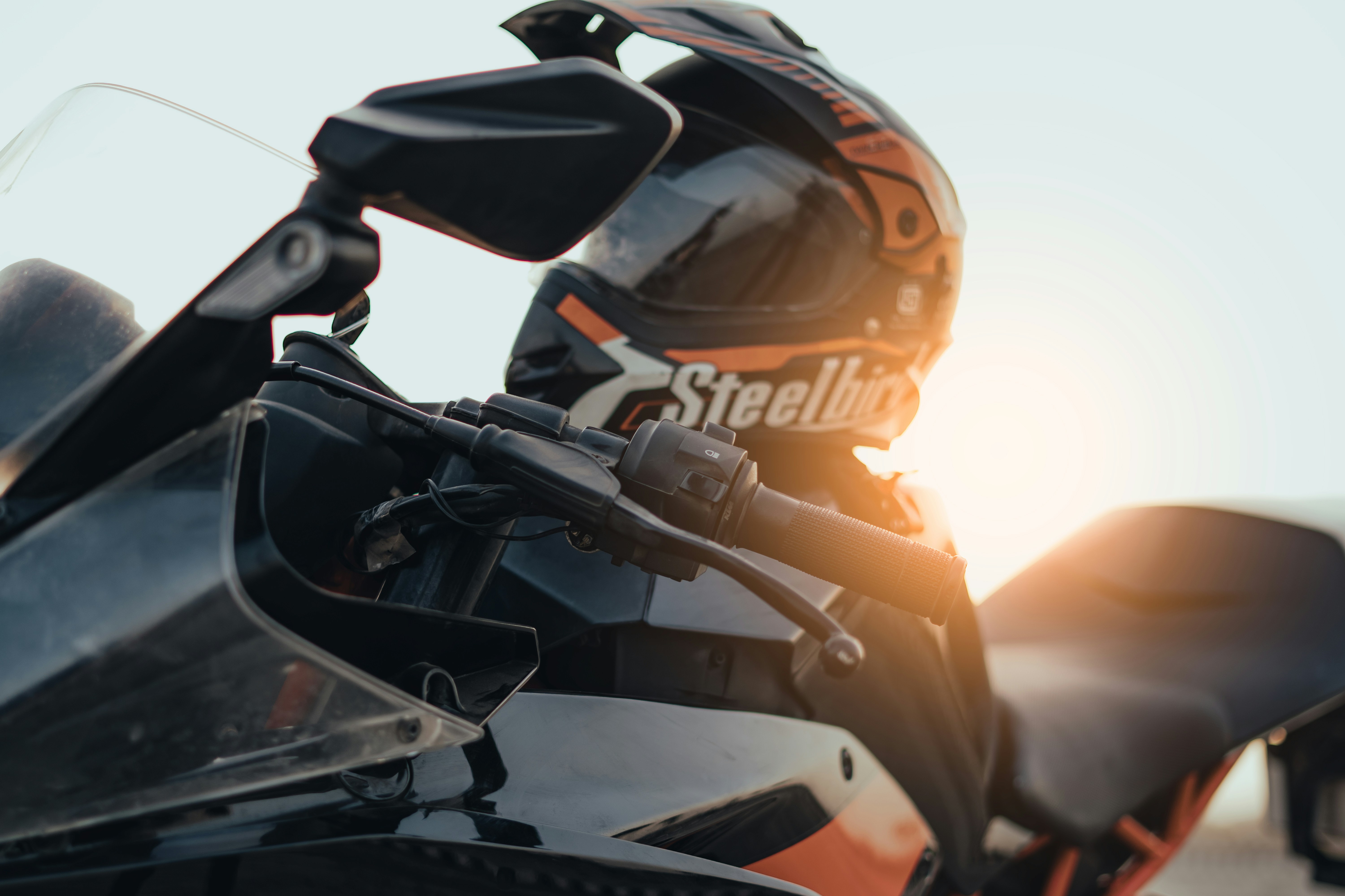 a close up of a motorcycle parked on a street