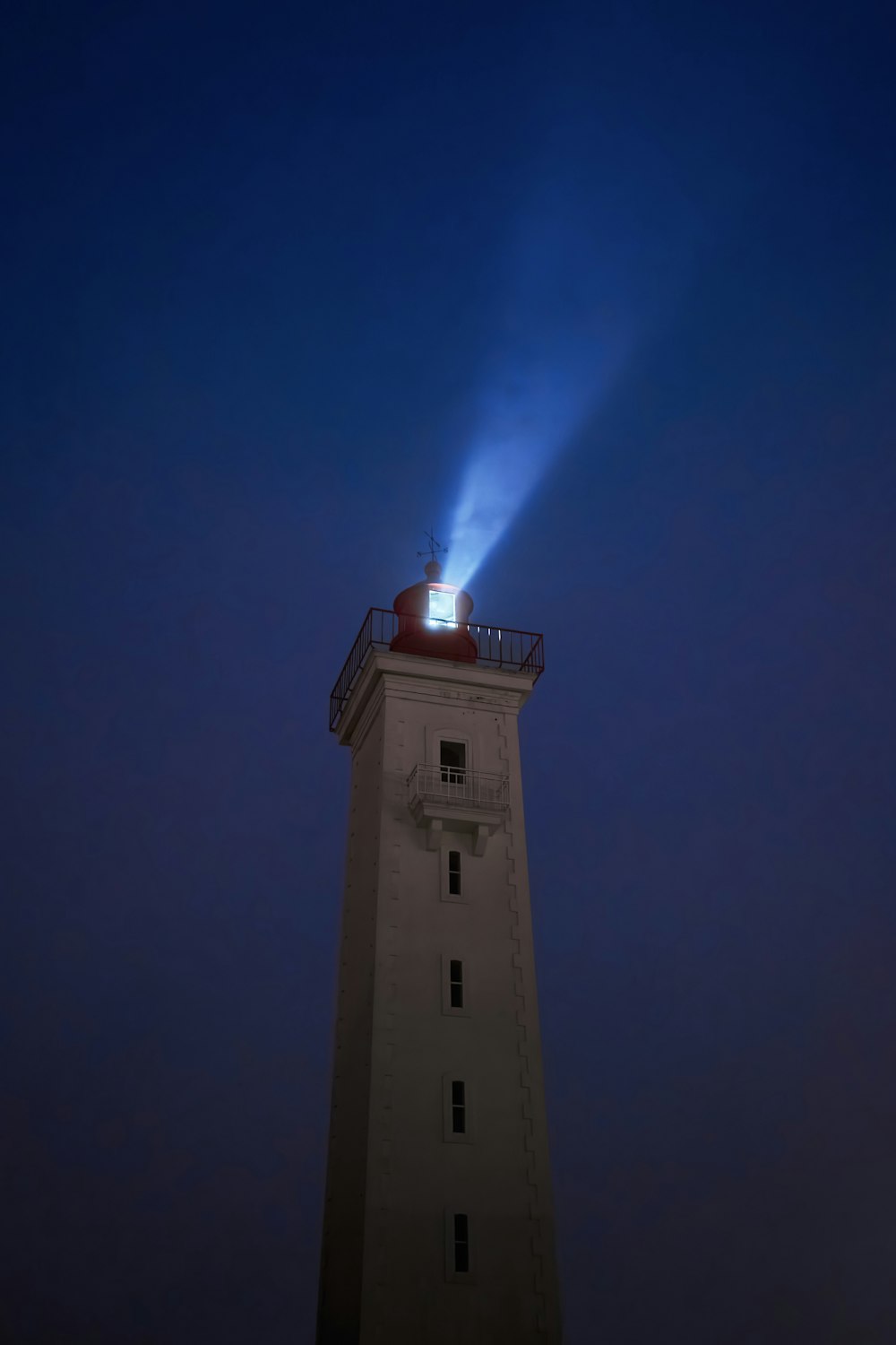 a lighthouse with a light on top of it