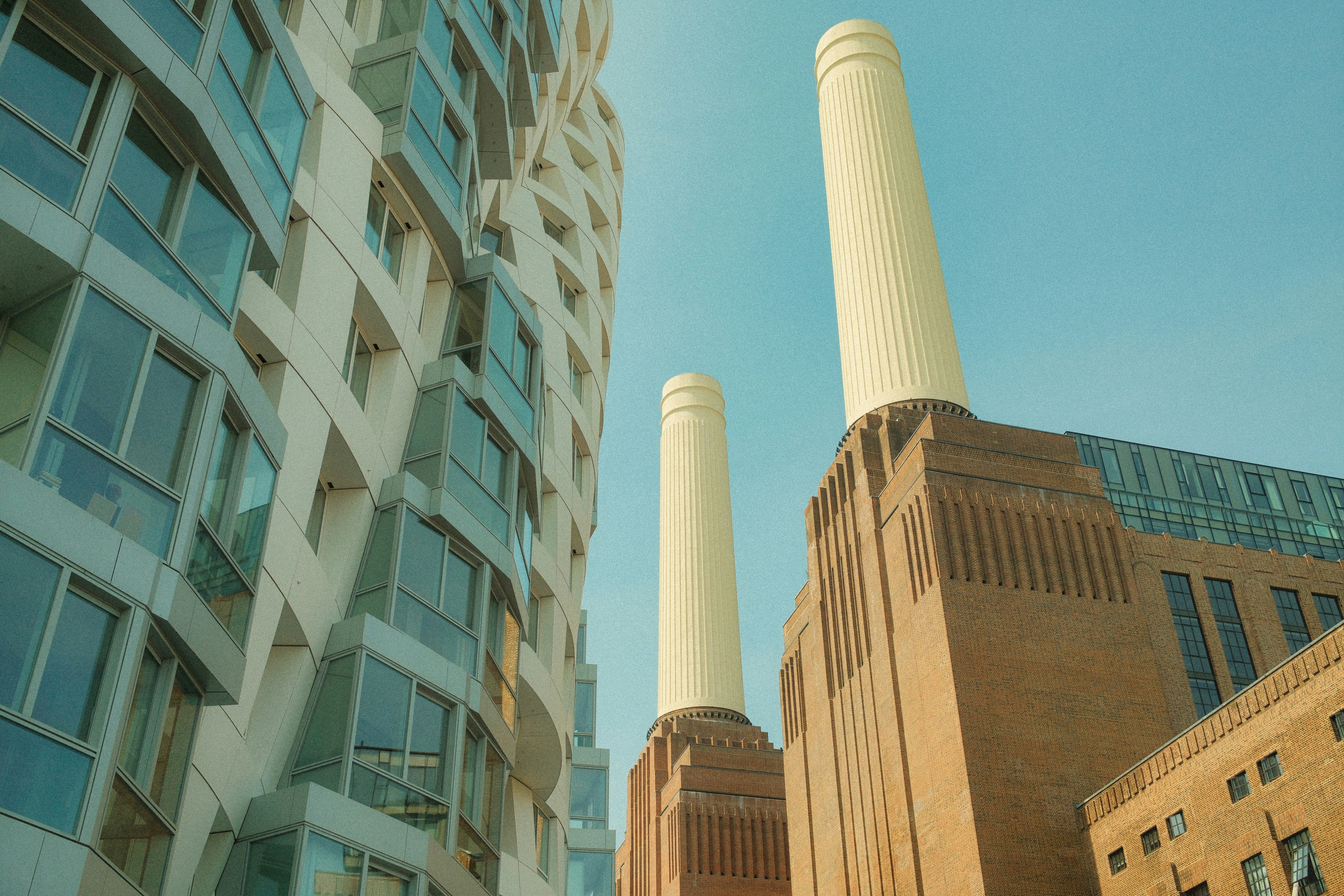 a couple of tall buildings next to each other