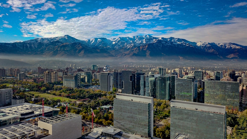 a view of a city with mountains in the background