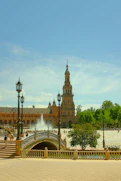 a large building with a bridge over it