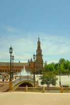 a large building with a bridge over it