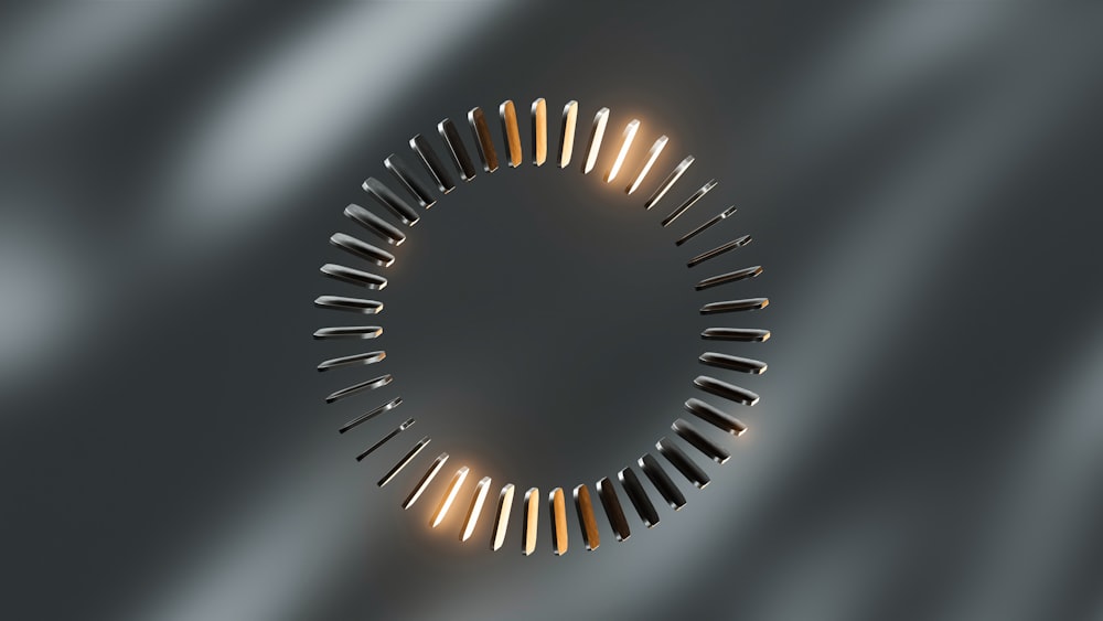 a circular metal object on a gray background