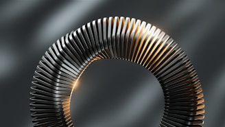 a circular metal object with a light shining through it