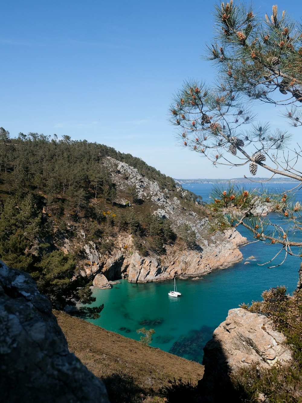 a view of a body of water from a cliff