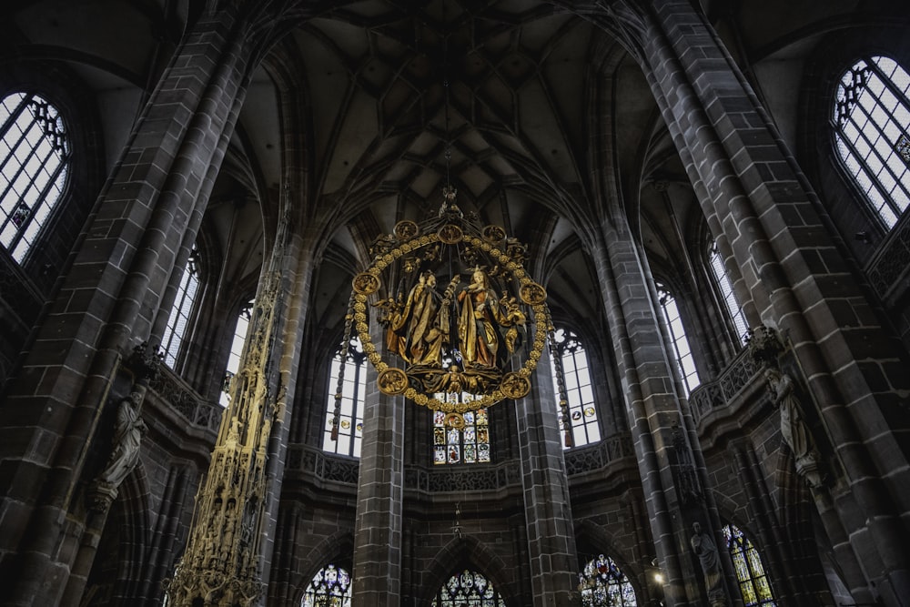 a large cathedral with a chandelier hanging from the ceiling