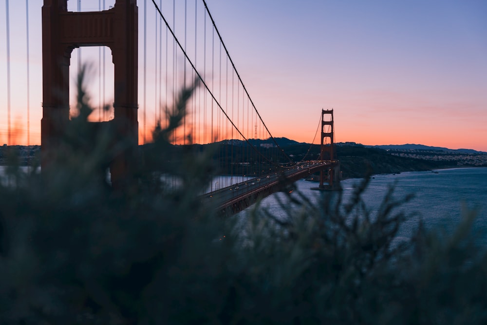 a view of the golden gate bridge at sunset