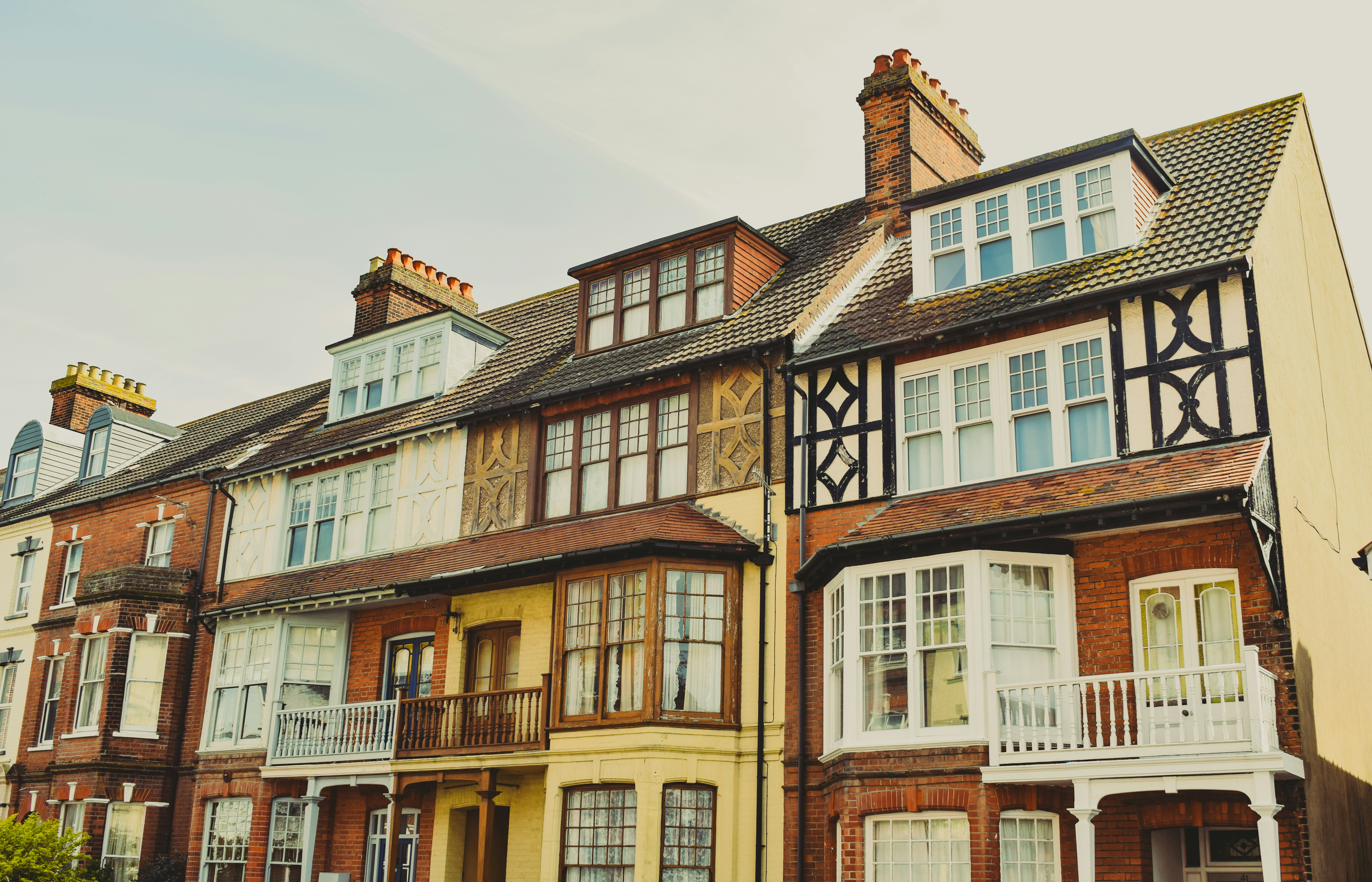 a row of multi - story houses with balconies and balconies on