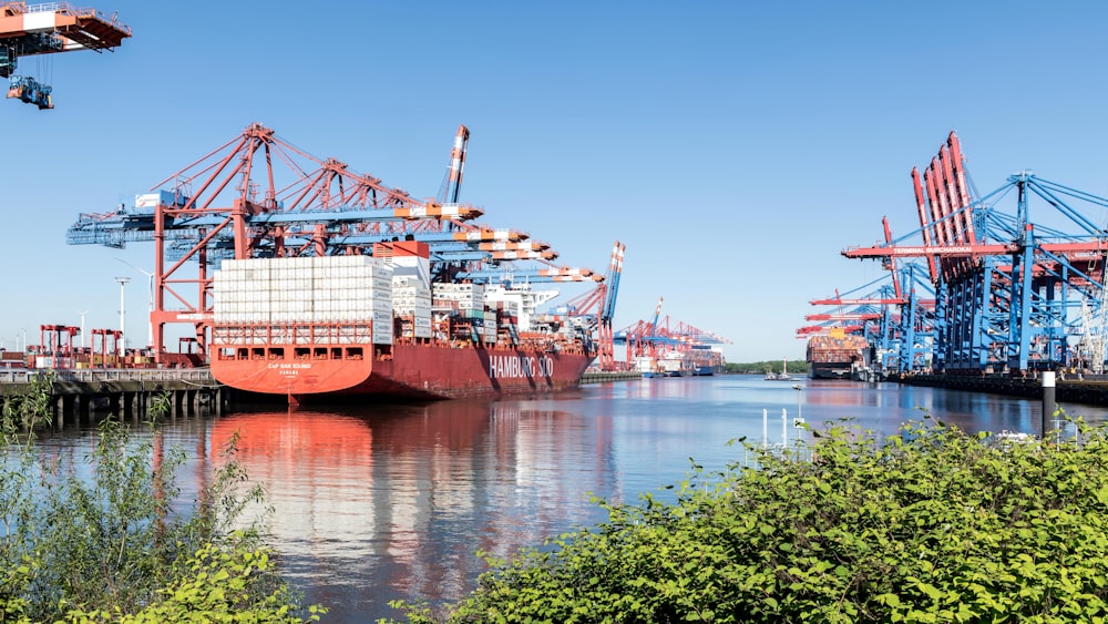 a large ship is docked at a dock