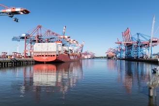 a large boat is docked at a dock