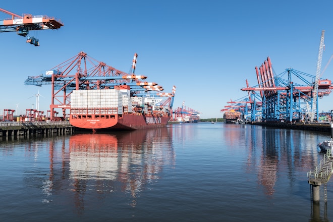 a large boat is docked at a dock