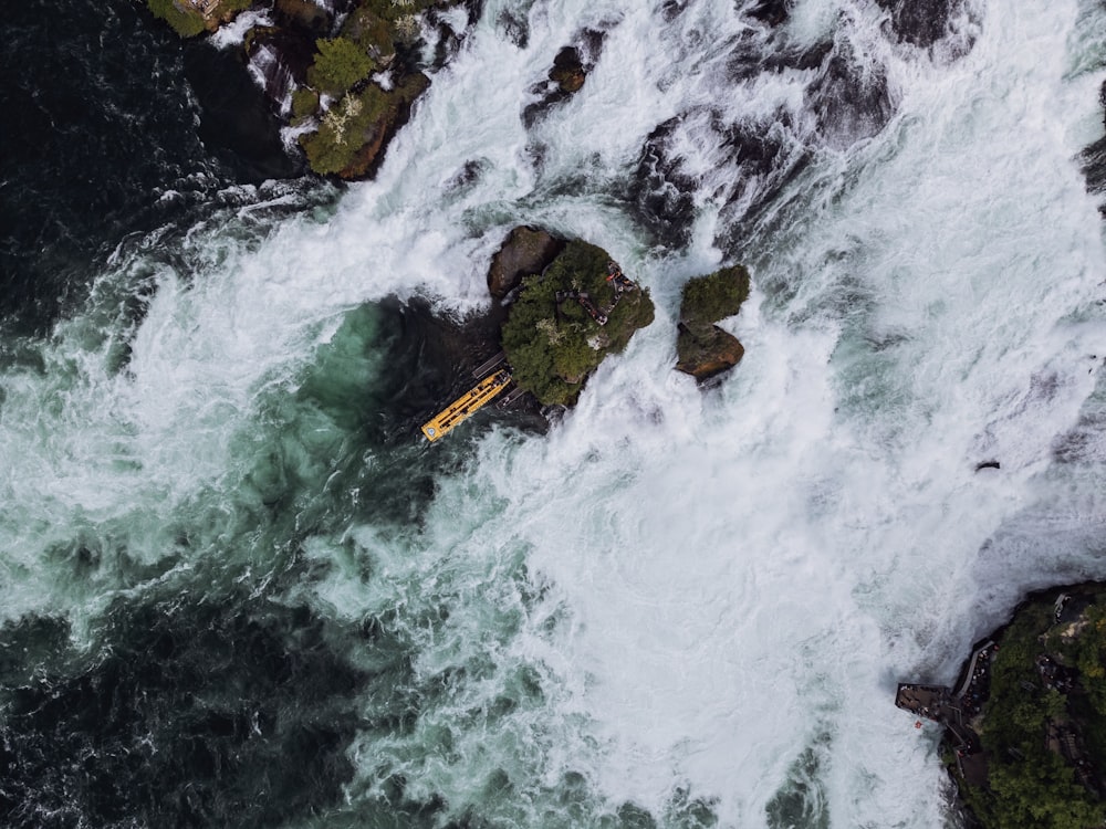 an aerial view of a boat in the water