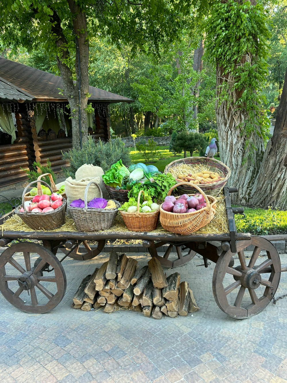 a table with baskets of vegetables on top of it