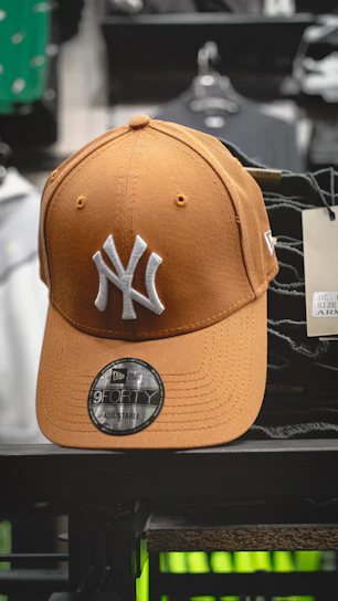 a new york yankees hat is on display