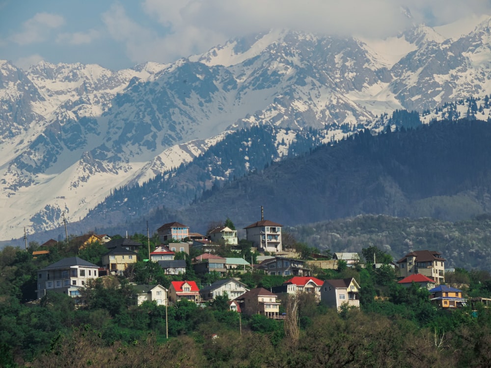 a view of a mountain range with houses on it