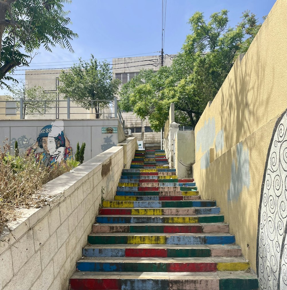 a set of stairs painted with different colors