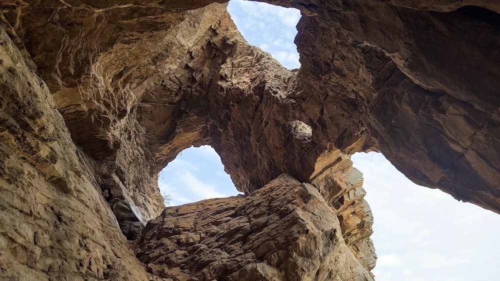 a rock formation with a hole in the middle