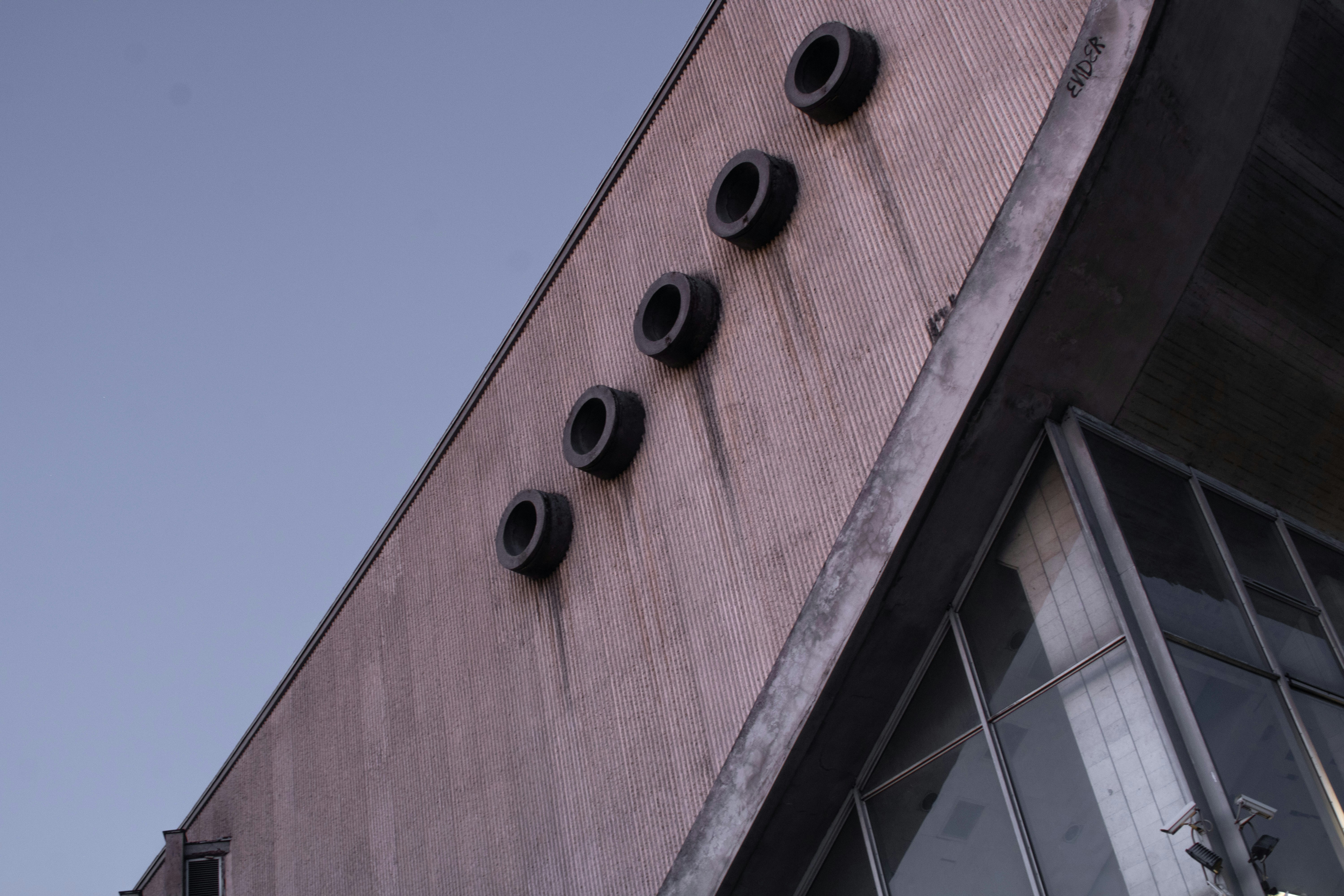 a building with a clock on the side of it