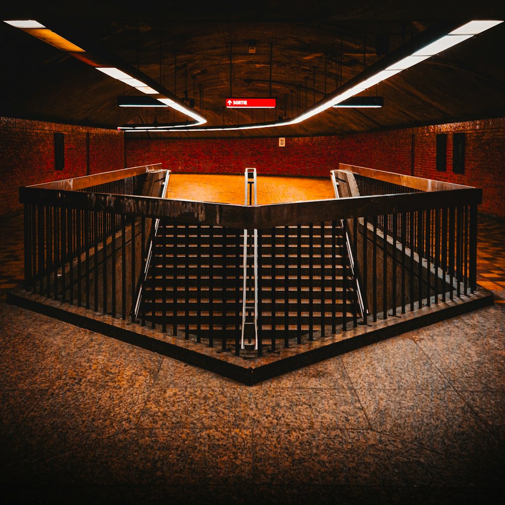 a large open area with stairs and railings