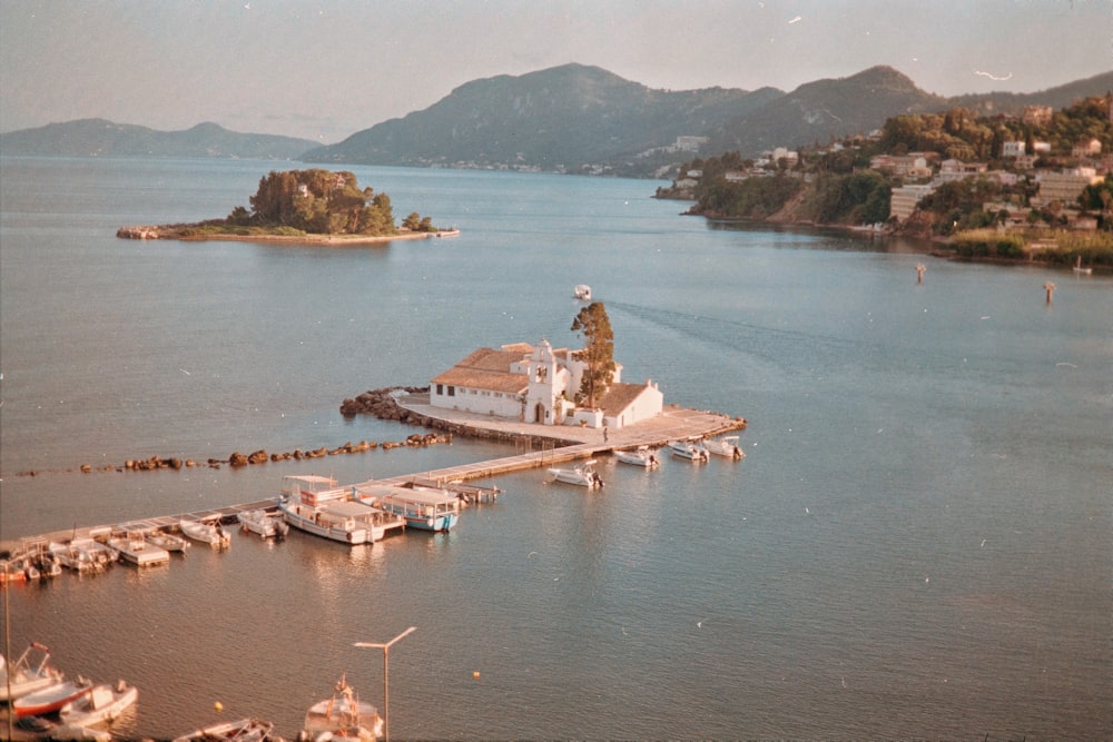 an aerial view of a small island in the middle of a body of water