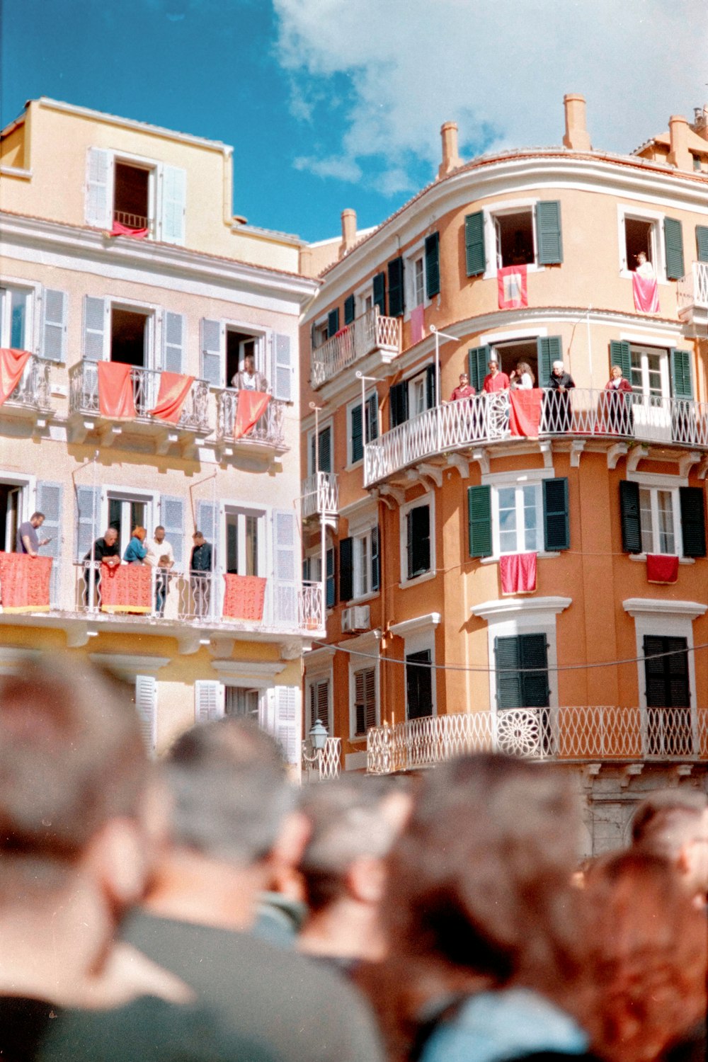 a group of people standing in front of a building