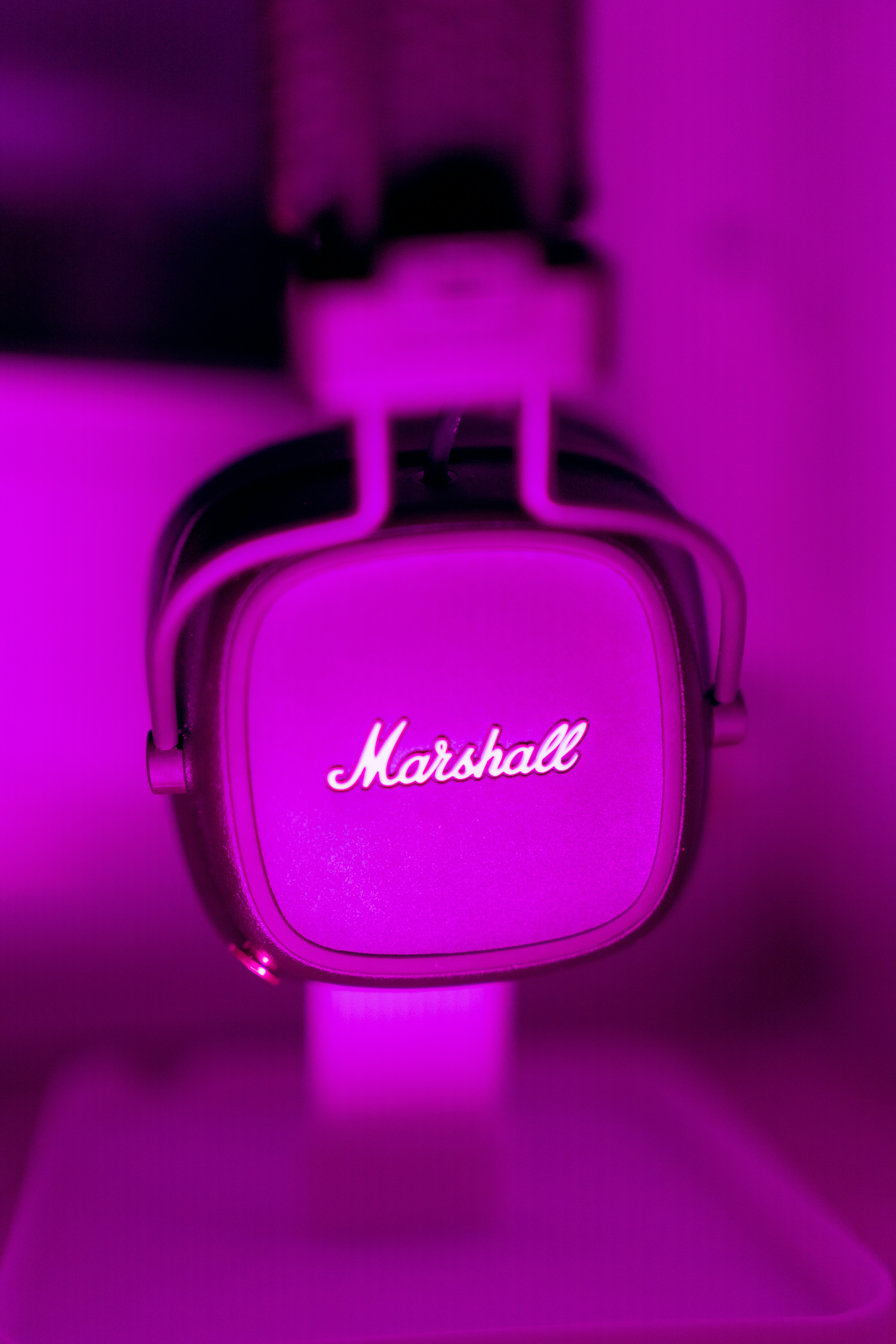 a close up of a purple light with a name on it