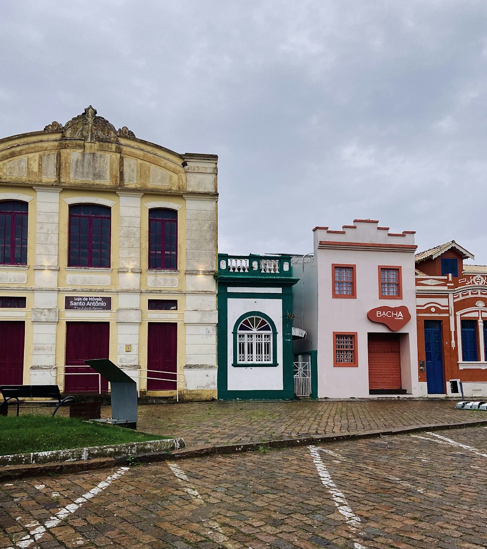 a row of colorful buildings sitting next to each other