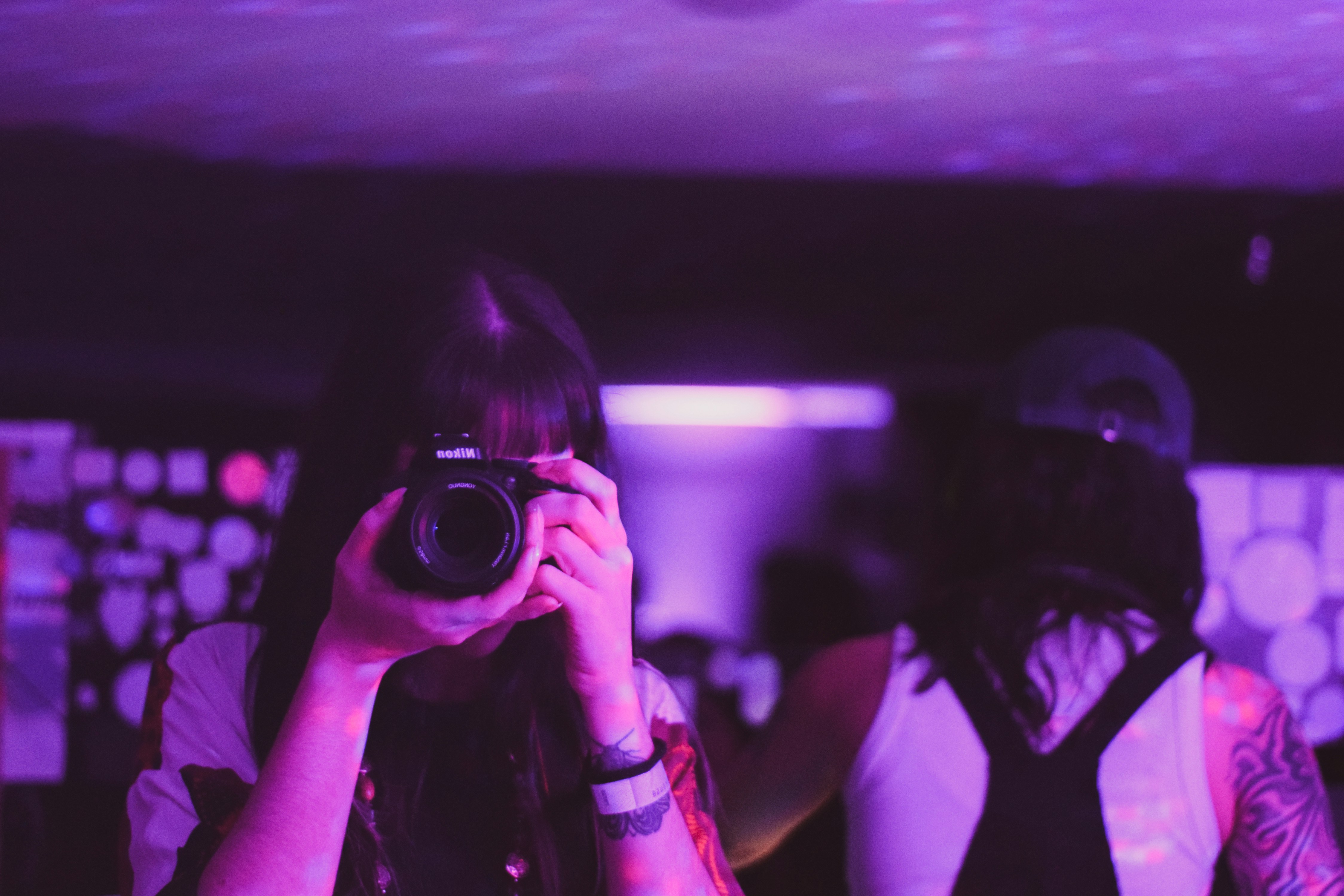 a person taking a picture with a camera