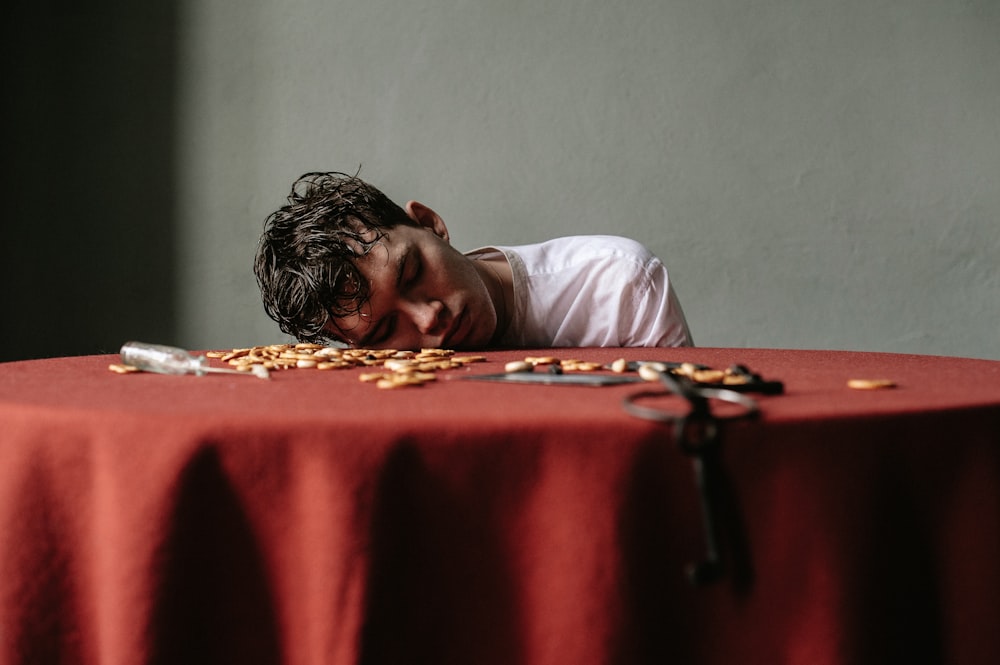 a man is laying down on a table