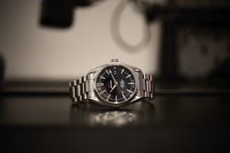 a watch sitting on a table in a room