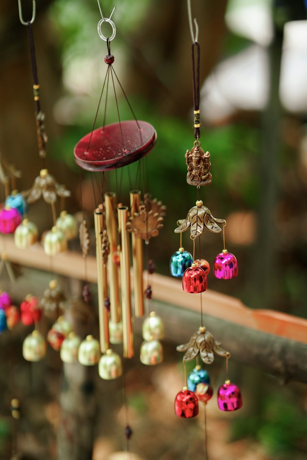 a wind chime hanging from a tree