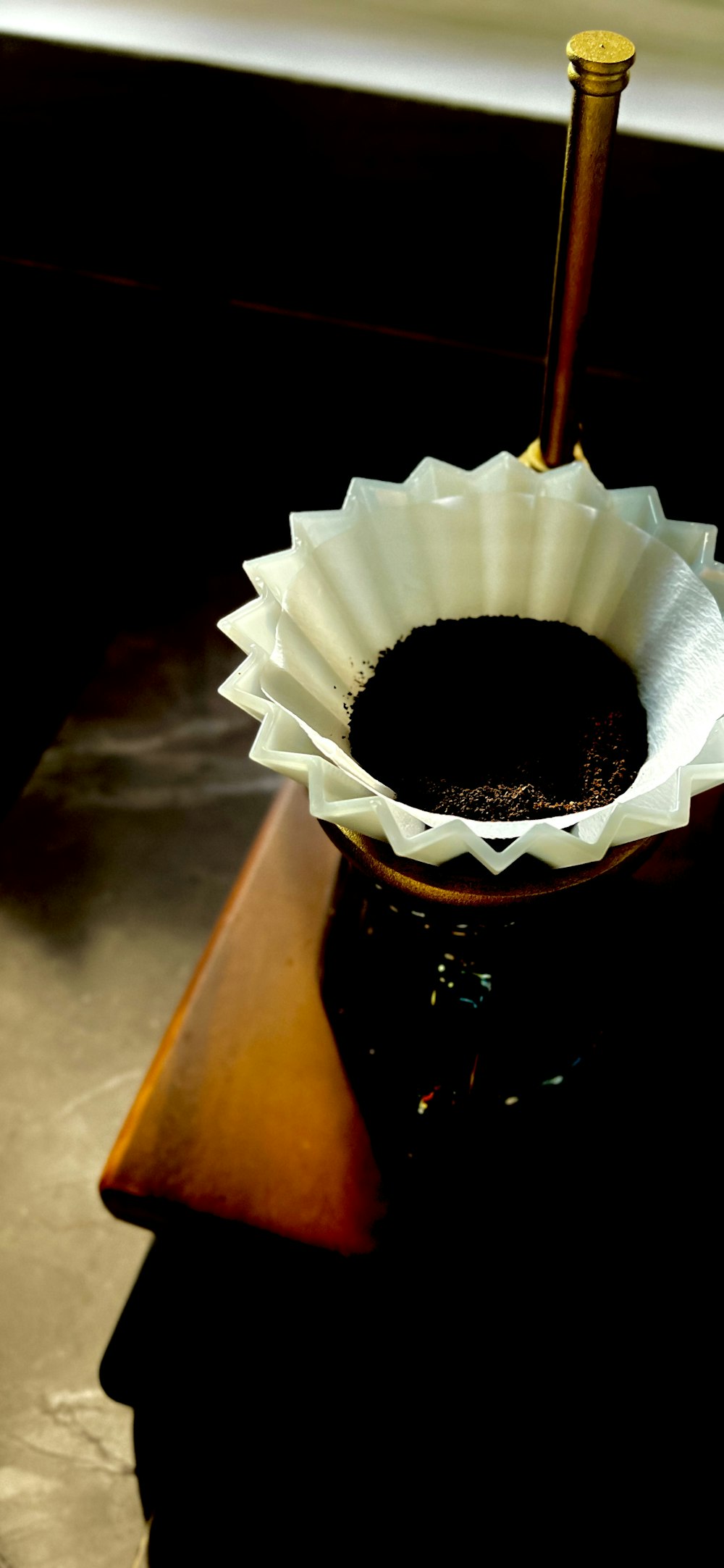 a chocolate cake in a paper cup on a table