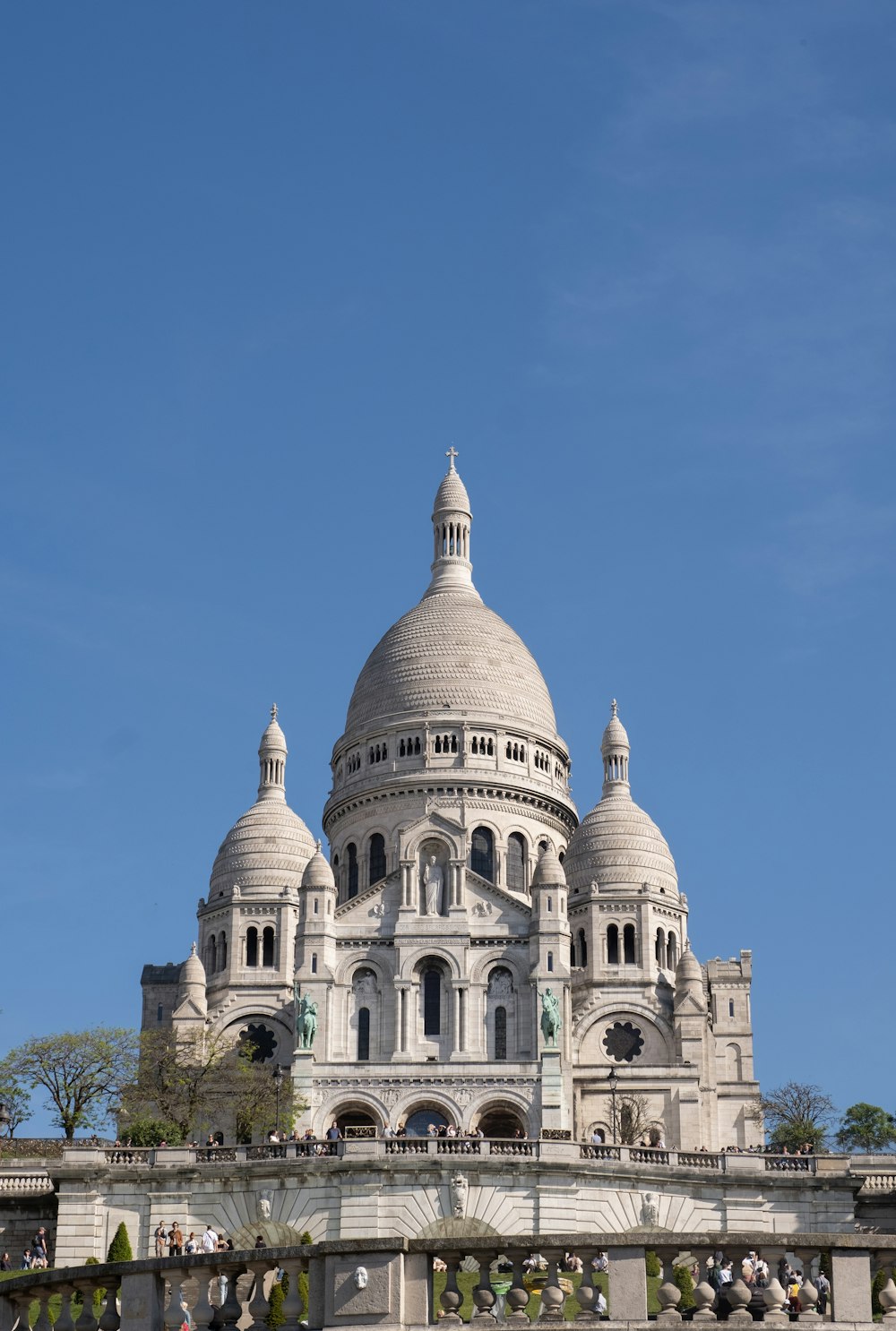 a large white building with a dome on top