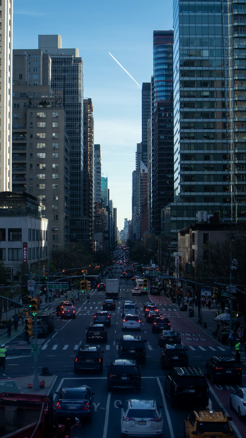 a city street filled with lots of traffic