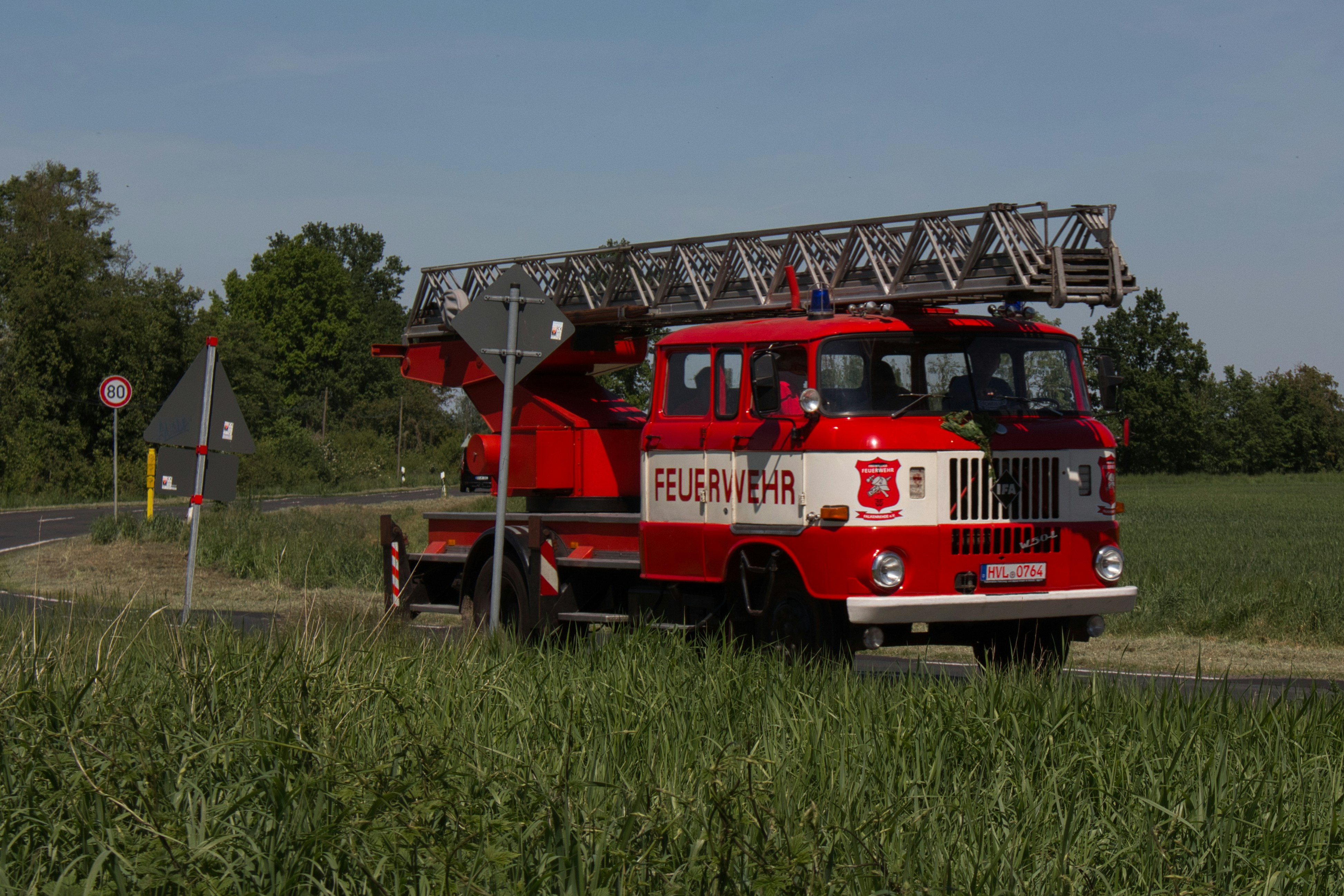 a red fire truck parked on the side of the road